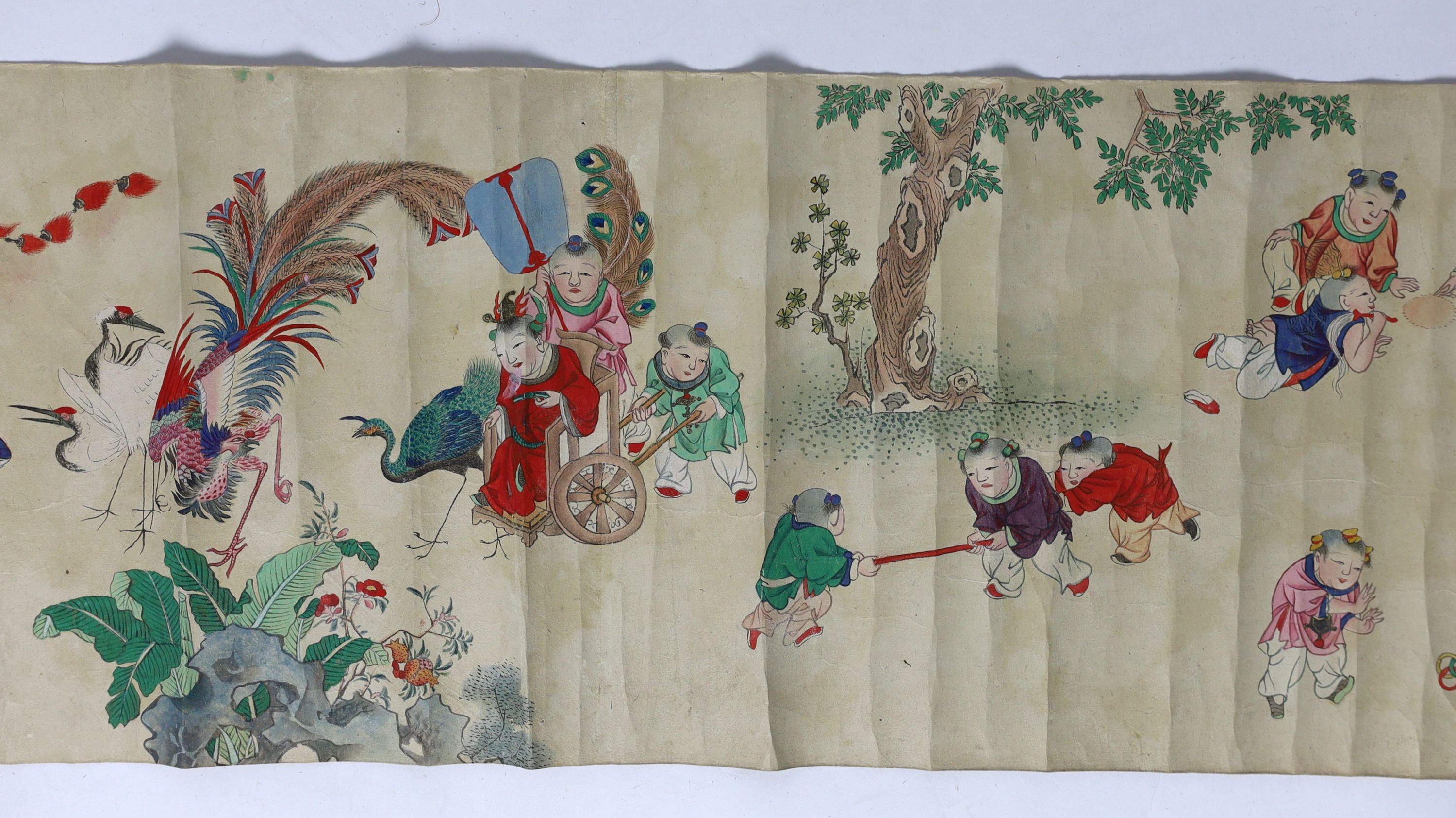 A Chinese handscroll painting on paper of ‘Hundred boys’ in a garden, late Qing dynasty, image 570cm x 26cm